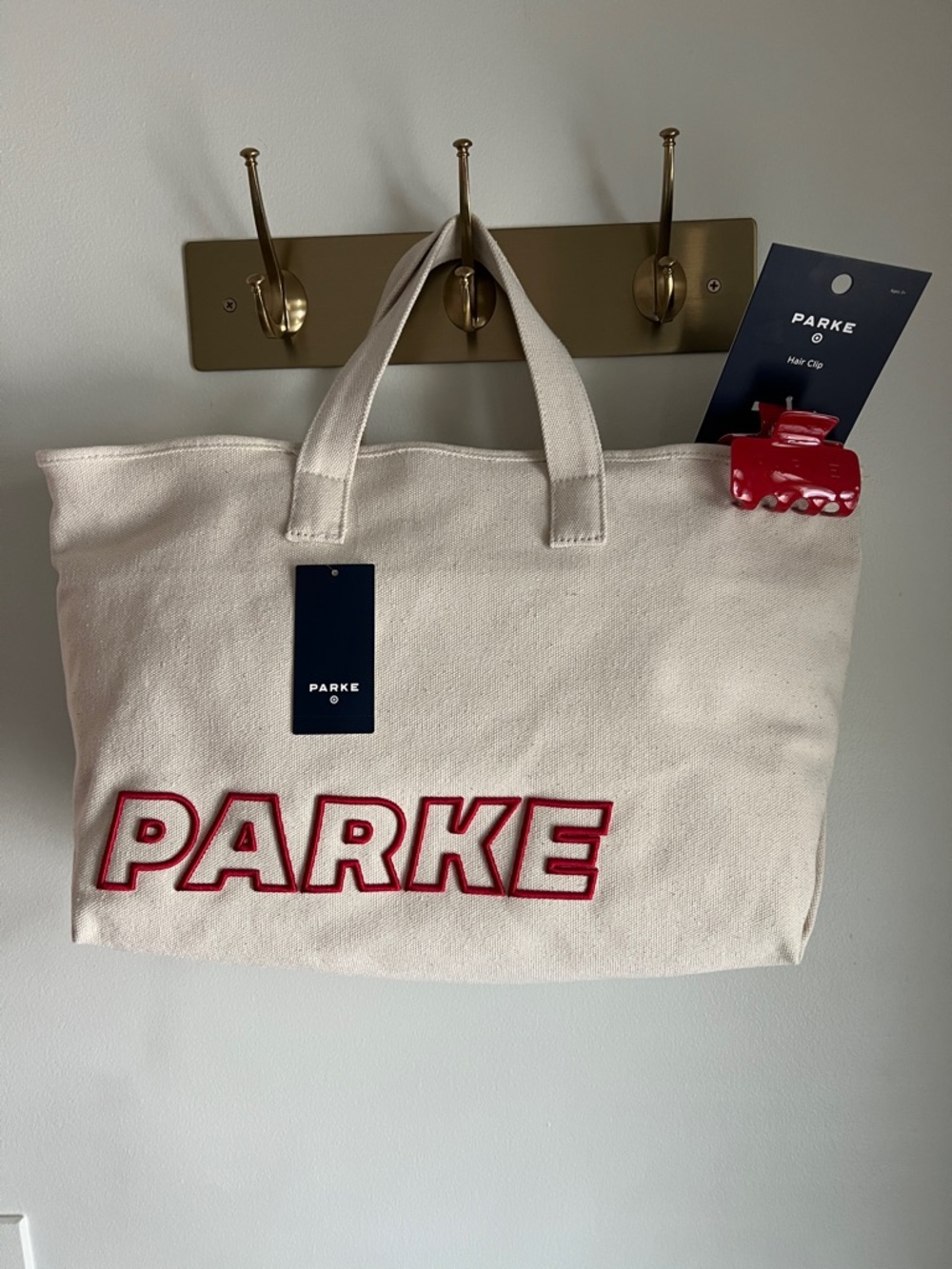 PARKE x Target Canvas Tote Bag with Red Logo and matching red claw clip